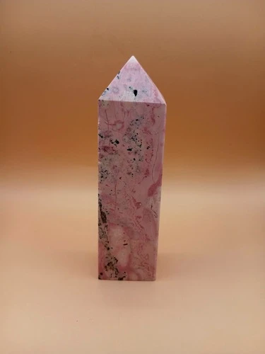 Pointe en Rhodonite – Qualité AA+ sur Fleur de Vie