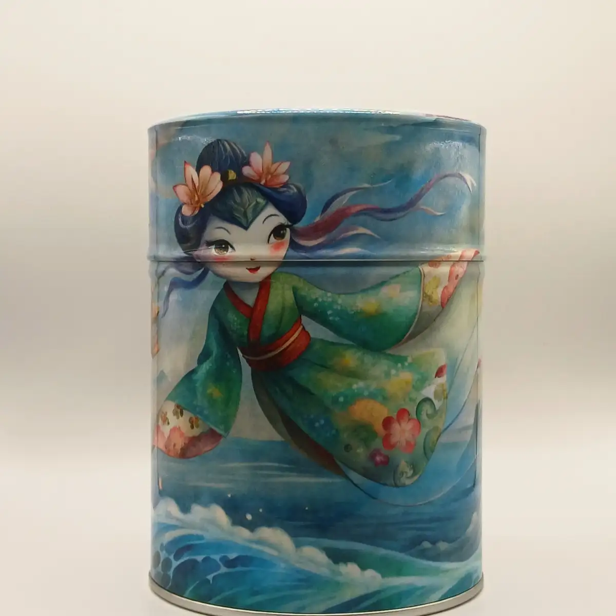 Boîte traditionnelle illustrée Jeune Femme qui danse au-dessus des vagues– 100g