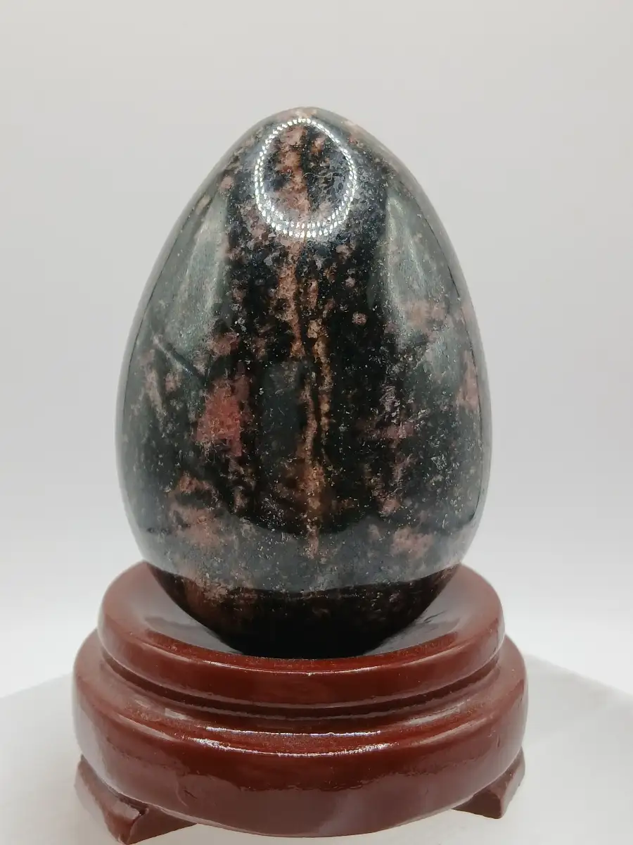 Œuf en Rhodonite – Ancrage & guérison émotionnelle